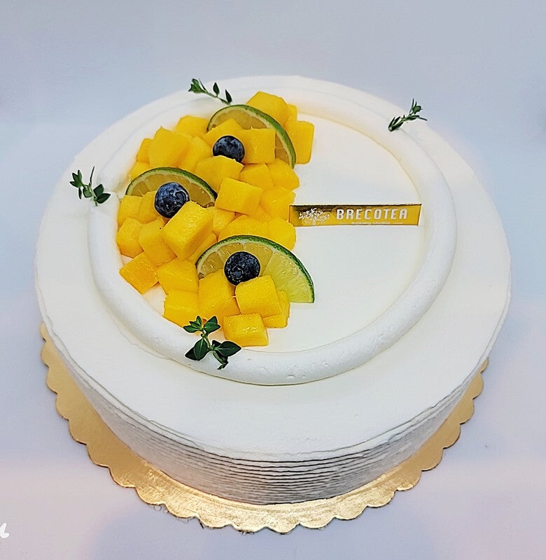 Truly Yummy Mango Truffle Cake - Parili Couture Cakes and Treats